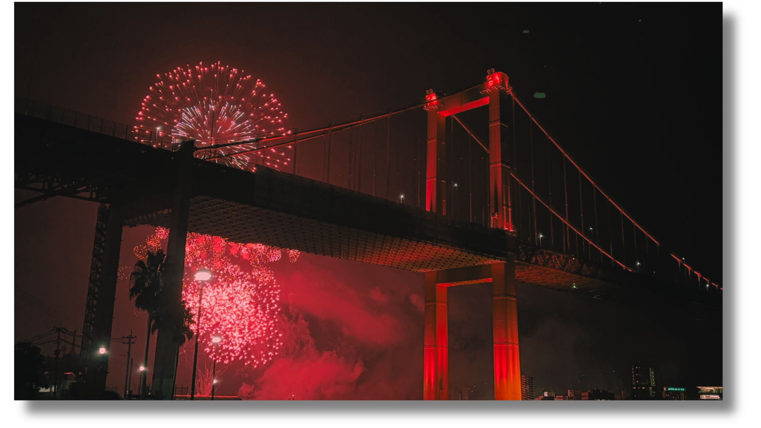 Fireworks over the Wakayama bridge, Fukuoka, Japan